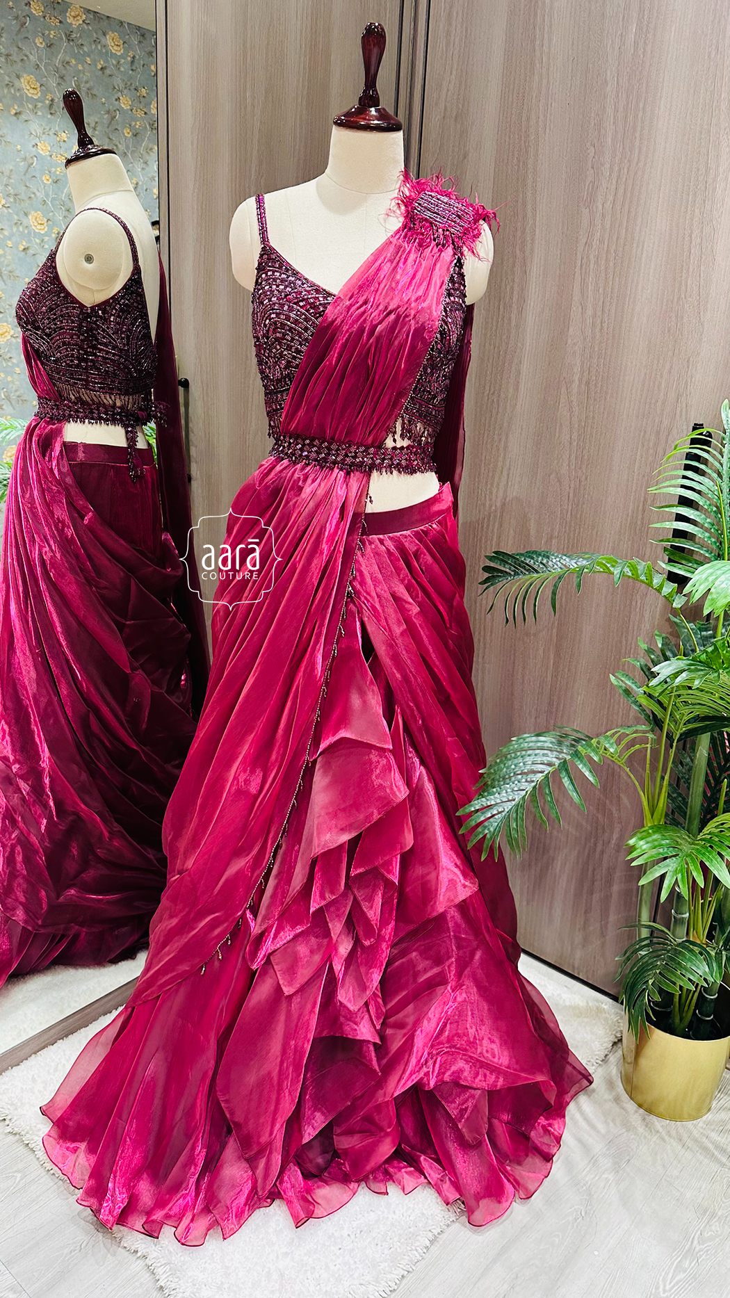 Hot Pink Ruffle Layered Lehenga With Heavily Embellished Spagetti Sleeved Maroon Choli Draped Dupatta And Waist belt 1